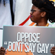 Ebonni Chrispin of AIDS Healthcare Foundation holds a sign during a press conference at the Florida state capital, hosted by Equality Florida, AIDS Healthcare Foundation and the Human Rights Campaign in opposition of HB 1577 (Don’t Say Gay bill) on Tuesday, February 15, 2022, in Tallahassee, Fla.